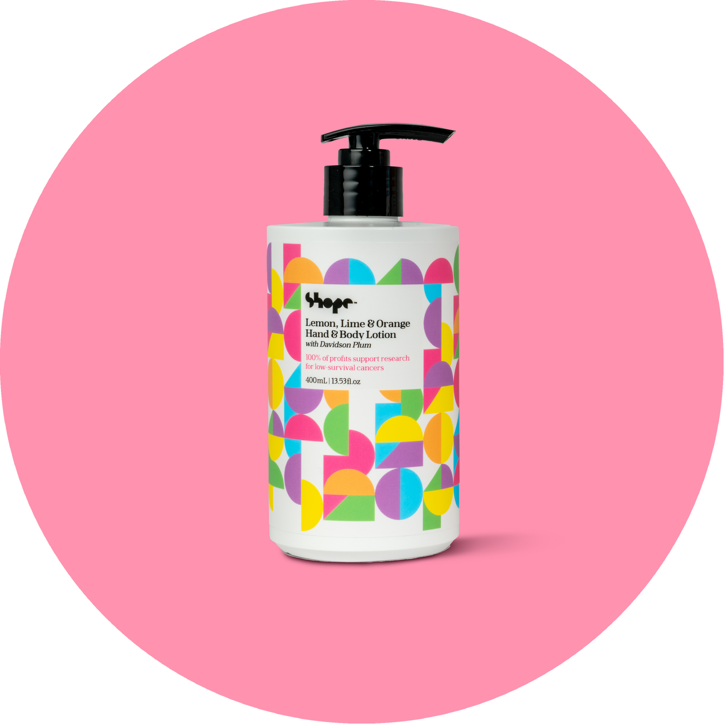 Unboxed SHOPE lemon lime and orange hand and body lotion, with pink circle background.
